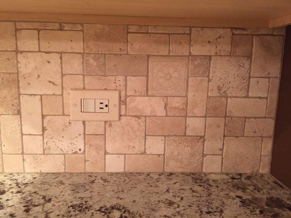 Example of a tuscan kitchen design in Chicago