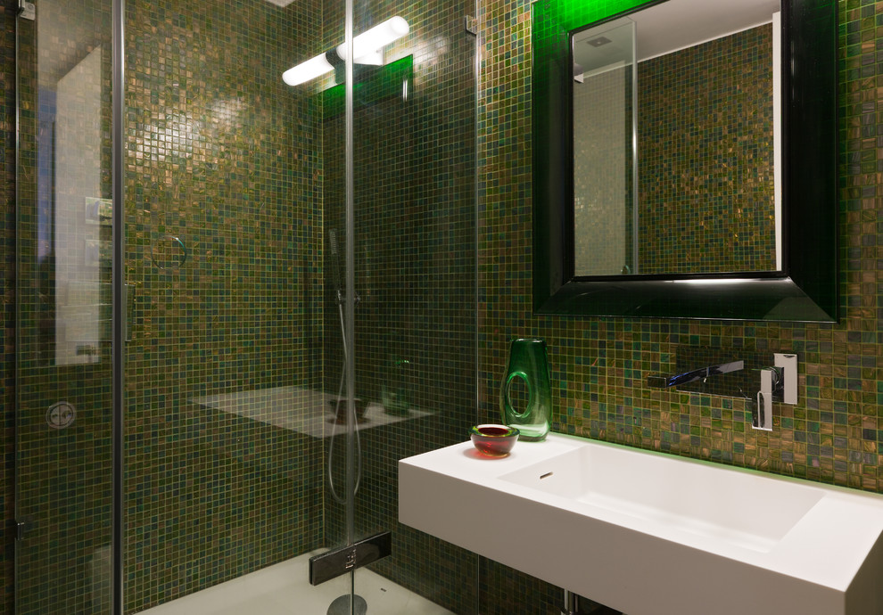 Inspiration for a contemporary bathroom in London with an open shower, mosaic tile, green walls, a wall-mount sink and a hinged shower door.