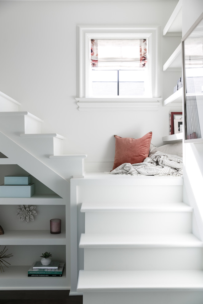 Mistflower - Inspiration for a mid-sized transitional guest medium tone wood floor and brown floor staircase remodel in Louisville with white walls