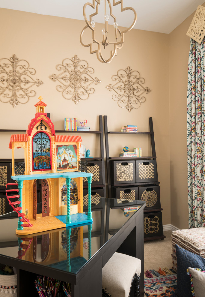 Photo of a mid-sized eclectic kids' playroom for kids 4-10 years old and girls in Phoenix with beige walls, carpet and beige floor.