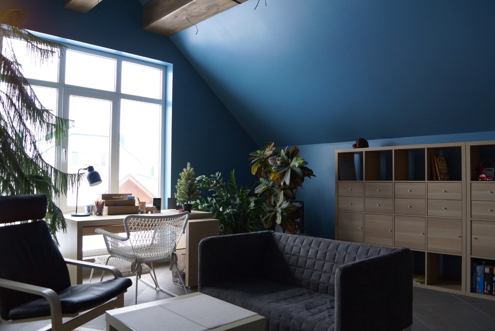 Large industrial kids' playroom in Other with blue walls, porcelain floors and grey floor for kids 4-10 years old and boys.