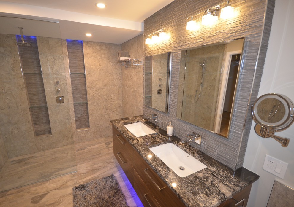 Contemporary master bathroom in Ottawa with flat-panel cabinets, medium wood cabinets, a hot tub, a curbless shower, gray tile, porcelain tile, porcelain floors, an undermount sink, granite benchtops, a two-piece toilet and an open shower.