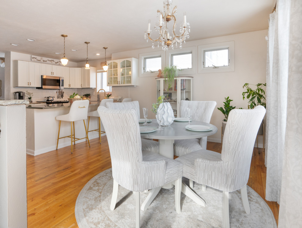 Example of a transitional kitchen design in Denver