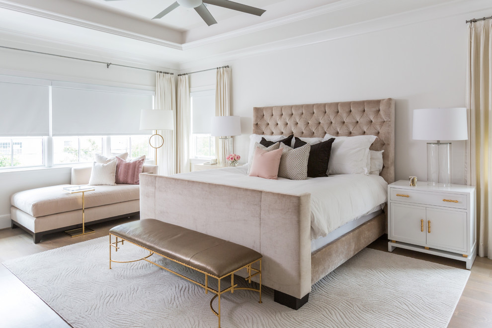 Bedroom - large transitional master porcelain tile bedroom idea in Houston with white walls