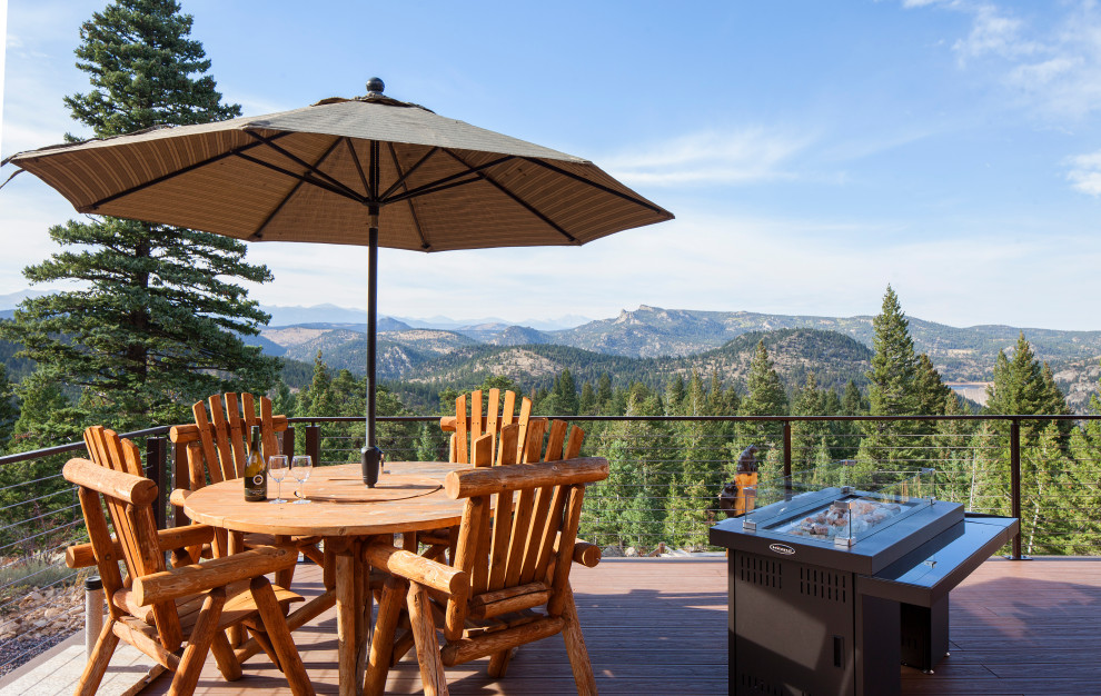 Deck - rustic deck idea in Denver