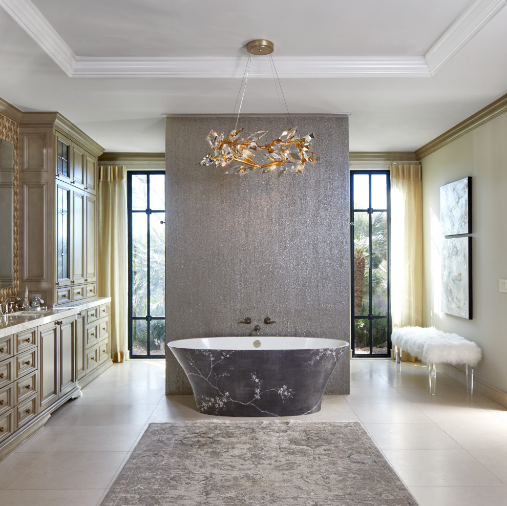 Design ideas for an expansive transitional master bathroom in Phoenix with raised-panel cabinets, beige cabinets, a freestanding tub, gray tile, beige walls, porcelain floors, an undermount sink, beige floor, beige benchtops, a double vanity and a built-in vanity.