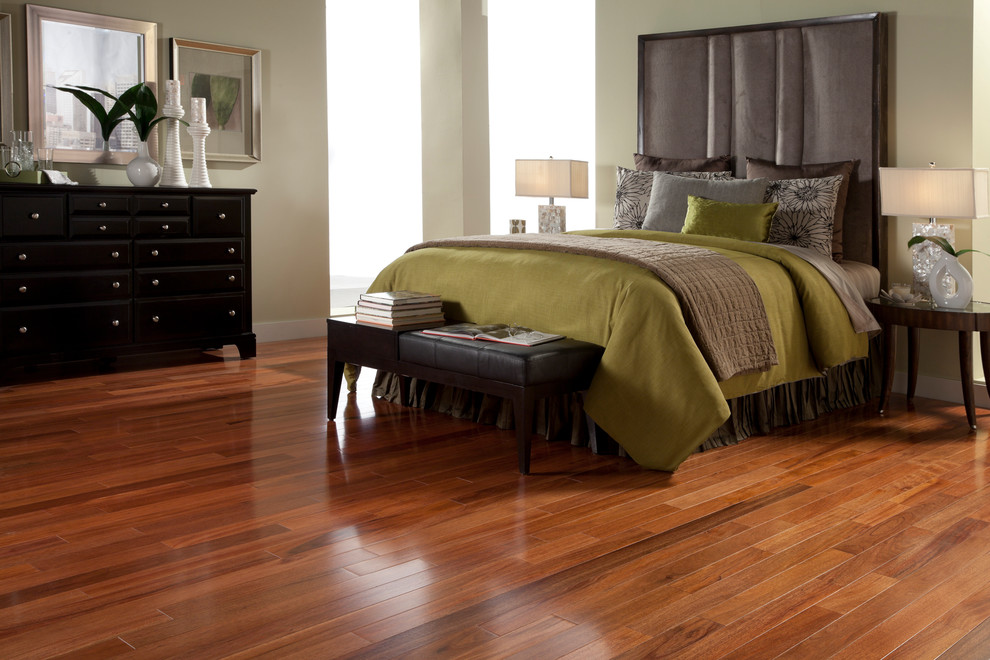 Mid-sized transitional guest dark wood floor and brown floor bedroom photo in Other with beige walls