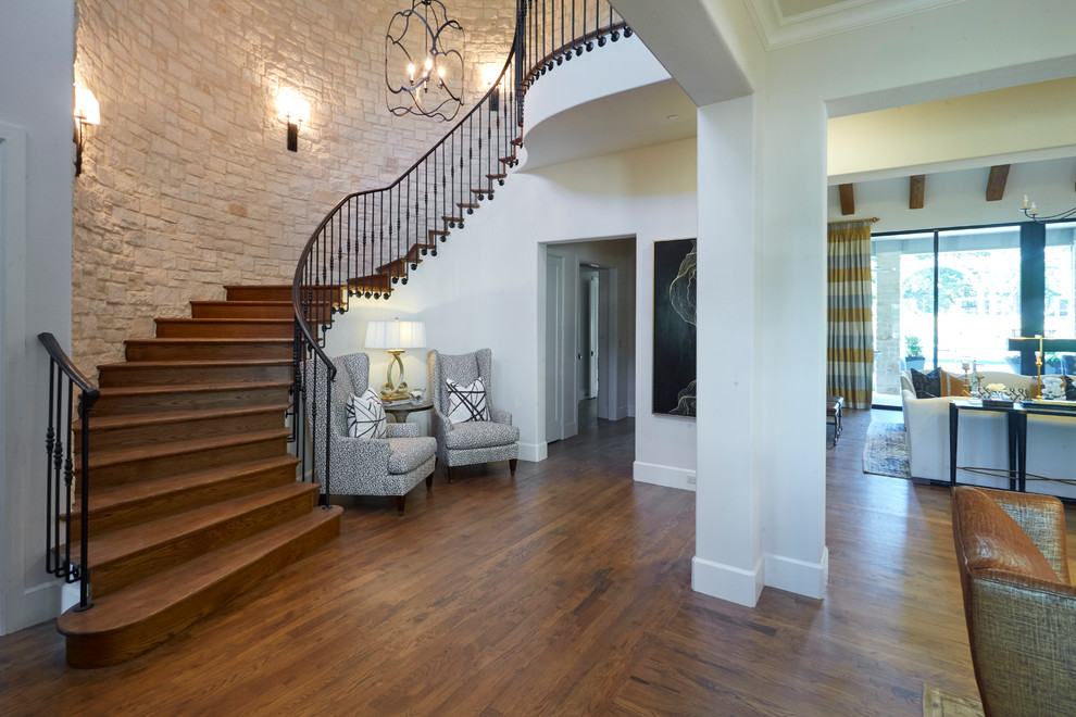 Inspiration for a mid-sized eclectic wood curved staircase in Dallas with wood risers.