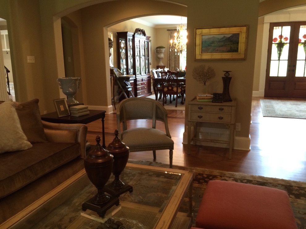 Example of a mid-sized transitional formal and open concept living room design with a standard fireplace and a stone fireplace