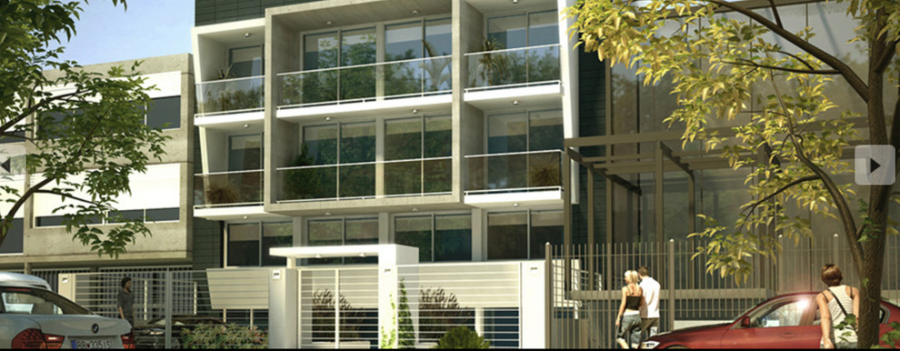 Example of a mid-sized trendy home design design
