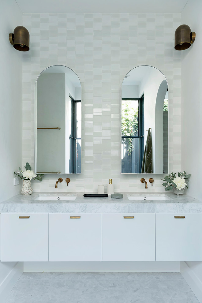 Photo of a small contemporary 3/4 bathroom in Perth with medium wood cabinets, a freestanding tub, white tile, white walls, cement tiles, a drop-in sink, engineered quartz benchtops, grey floor, yellow benchtops, a single vanity and a floating vanity.