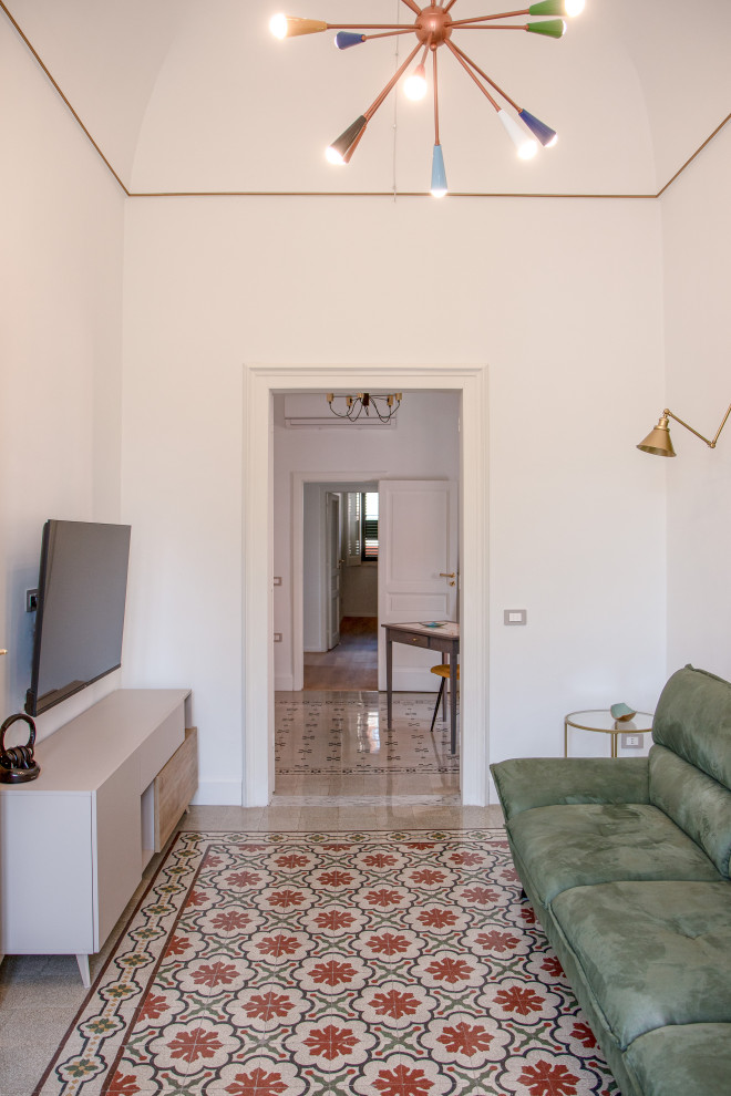 Ristrutturazione di un immobile anni 40 con recupero cementine, volte e infissi