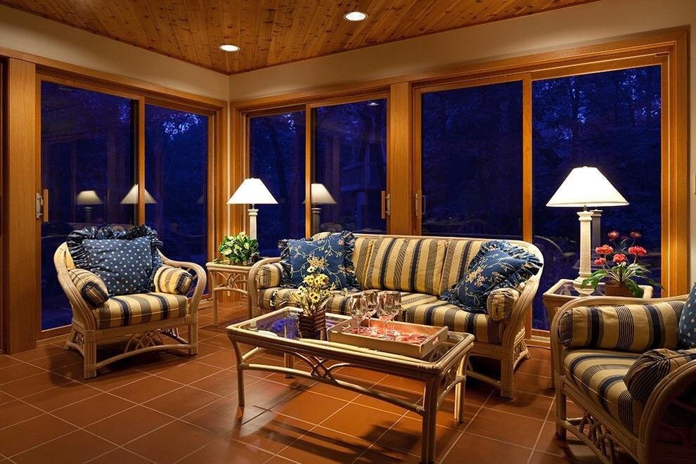 Inspiration for a small beach style sunroom in Nashville with ceramic floors, a standard ceiling and brown floor.