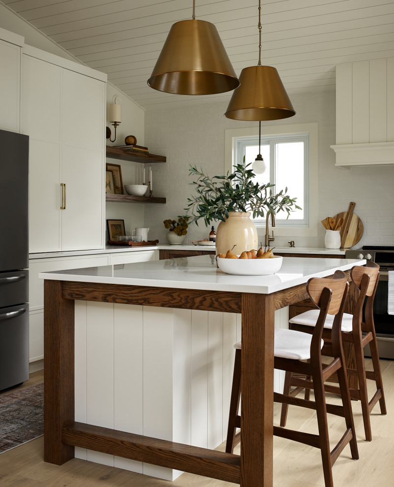 Example of a transitional kitchen design in Toronto