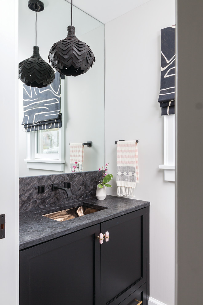 This is an example of a transitional kids bathroom in New York with shaker cabinets, black cabinets, an undermount sink, a single vanity, a freestanding vanity, white walls, marble benchtops and black benchtops.