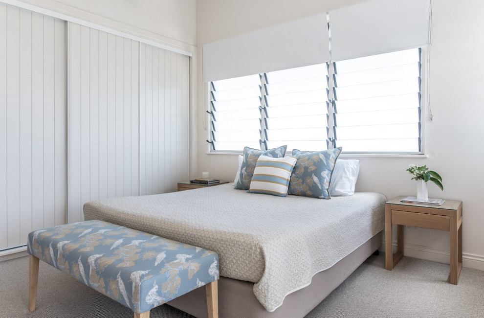 Small beach style master bedroom in Sunshine Coast.