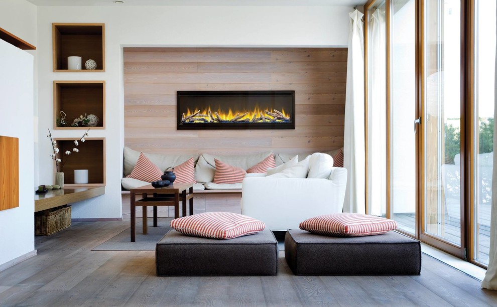 This is an example of a mid-sized contemporary living room in Dallas with white walls, dark hardwood floors, a ribbon fireplace, a wood fireplace surround and brown floor.
