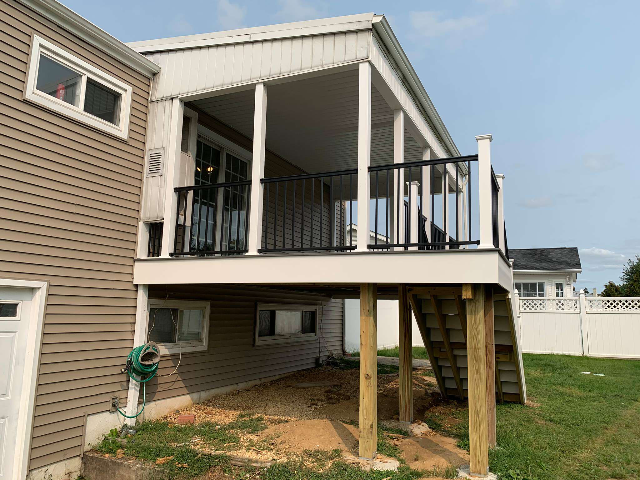 Resurfaced old deck with Trex transcends Island Mist Color
