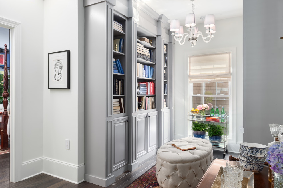 Inspiration for a mid-sized traditional study room in DC Metro with grey walls, dark hardwood floors, no fireplace, a freestanding desk and brown floor.
