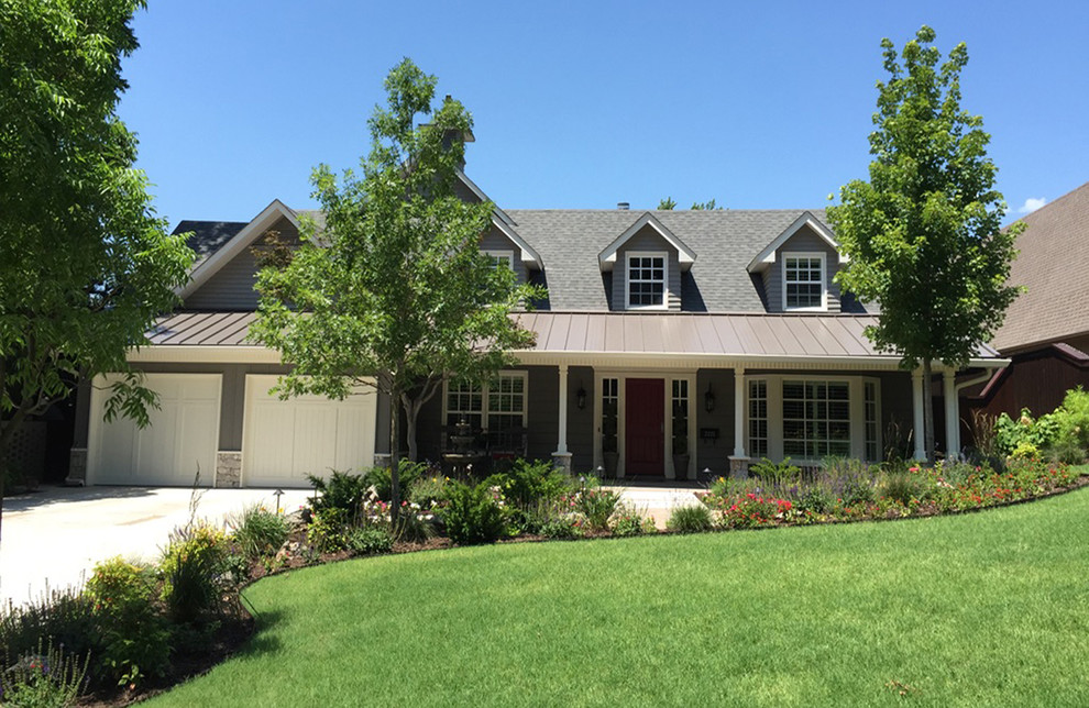 Example of a large transitional gray two-story mixed siding exterior home design