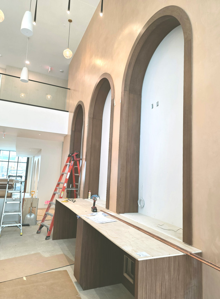 Inspiration for a large transitional foyer remodel with beige walls