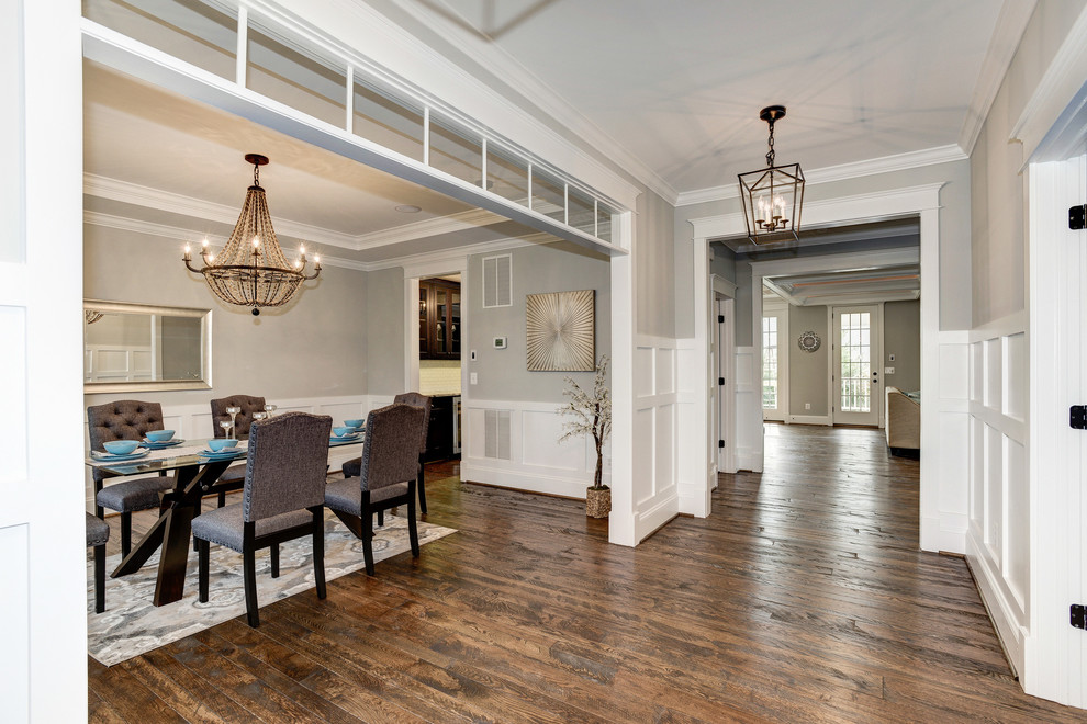 Design ideas for a large traditional open plan dining in DC Metro with grey walls and dark hardwood floors.