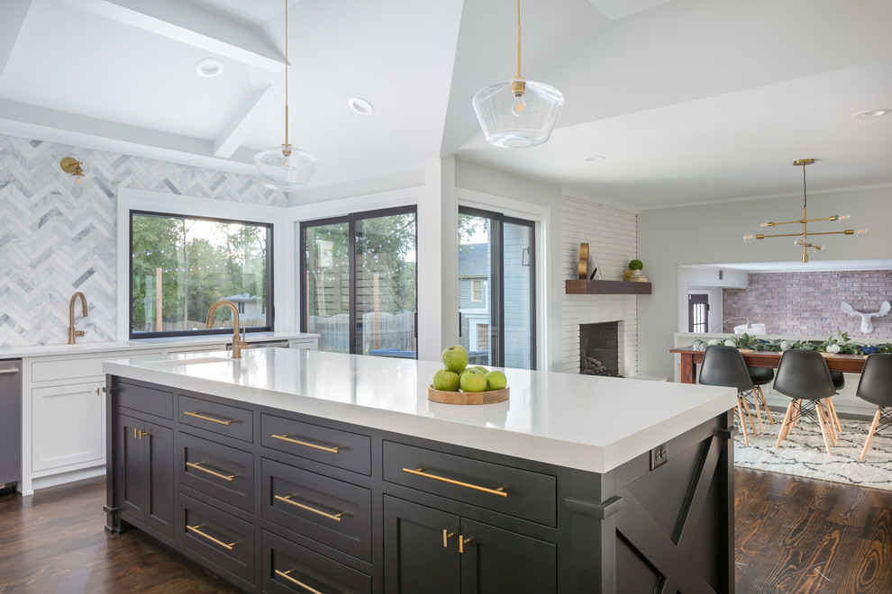 Inspiration for a large transitional u-shaped eat-in kitchen in Raleigh with an undermount sink, shaker cabinets, white cabinets, quartzite benchtops, grey splashback, marble splashback, stainless steel appliances, dark hardwood floors, with island, brown floor and white benchtop.