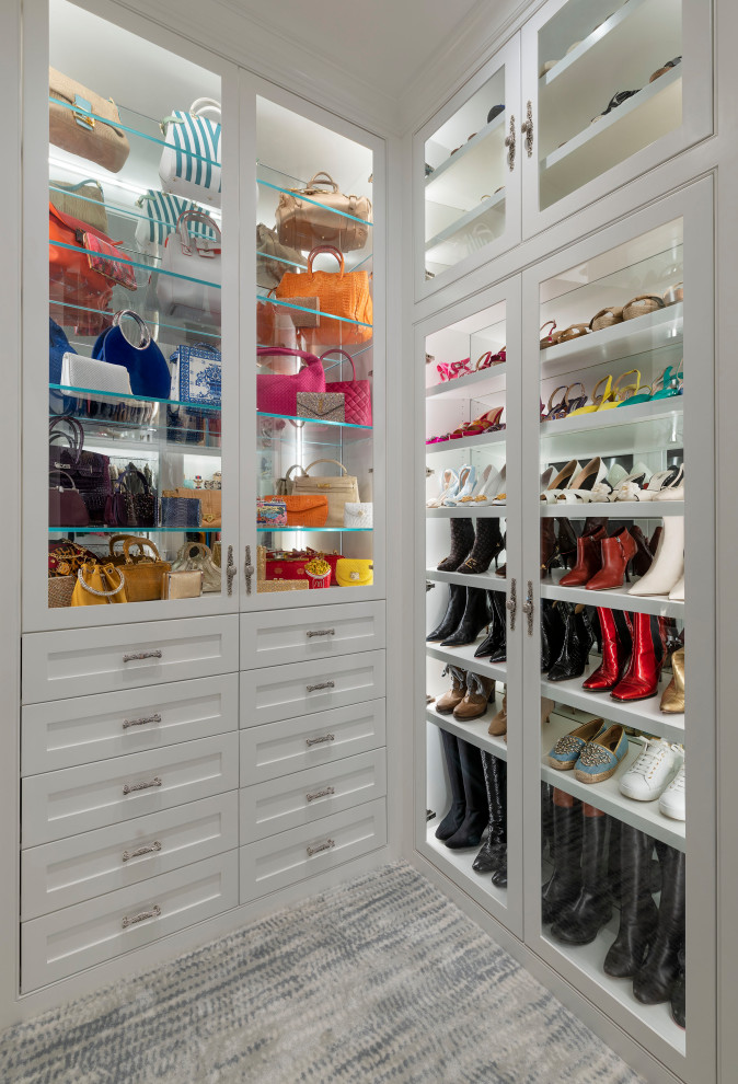 Inspiration for a mid-sized transitional gender-neutral walk-in wardrobe in Dallas with shaker cabinets, white cabinets, carpet and grey floor.