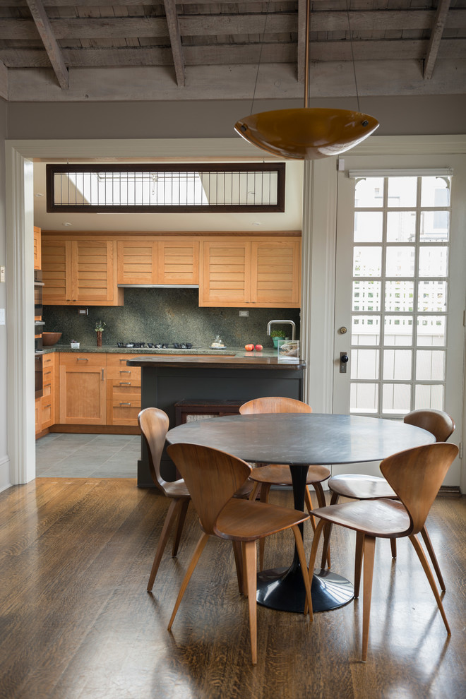 Inspiration for a contemporary kitchen/dining combo in San Francisco with dark hardwood floors.