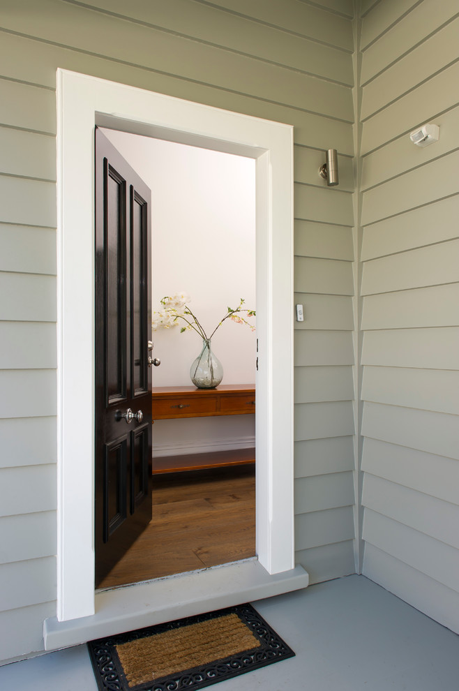 This is an example of a grey exterior in Auckland with wood siding.