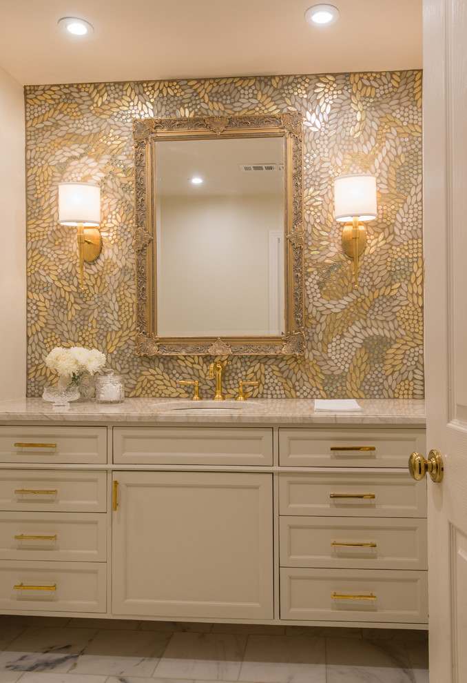 This is an example of a transitional powder room in Austin with quartzite benchtops.