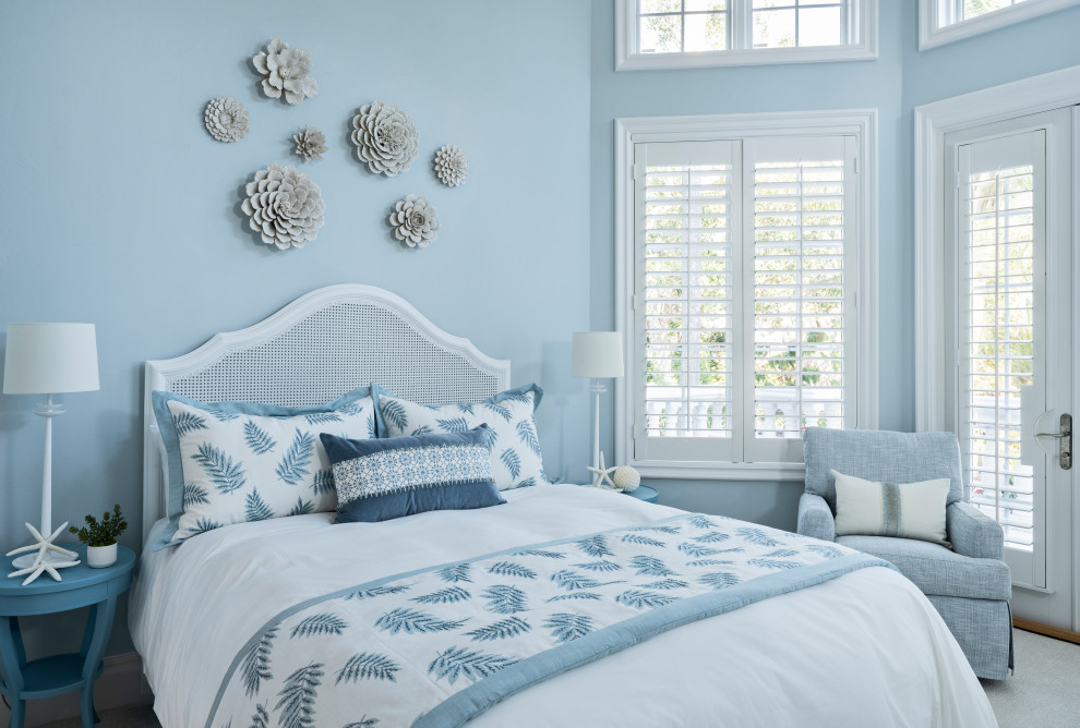 Example of a large transitional guest carpeted and blue floor bedroom design with blue walls