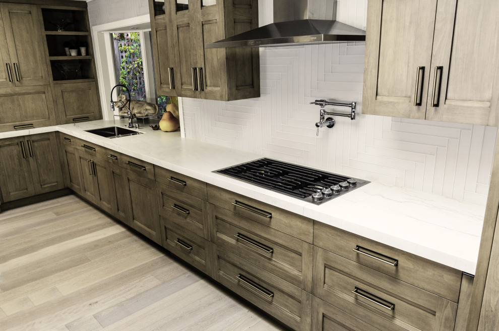 Tempest Blue Quartzite with built in dog bowls Perimeter is MontBlanc