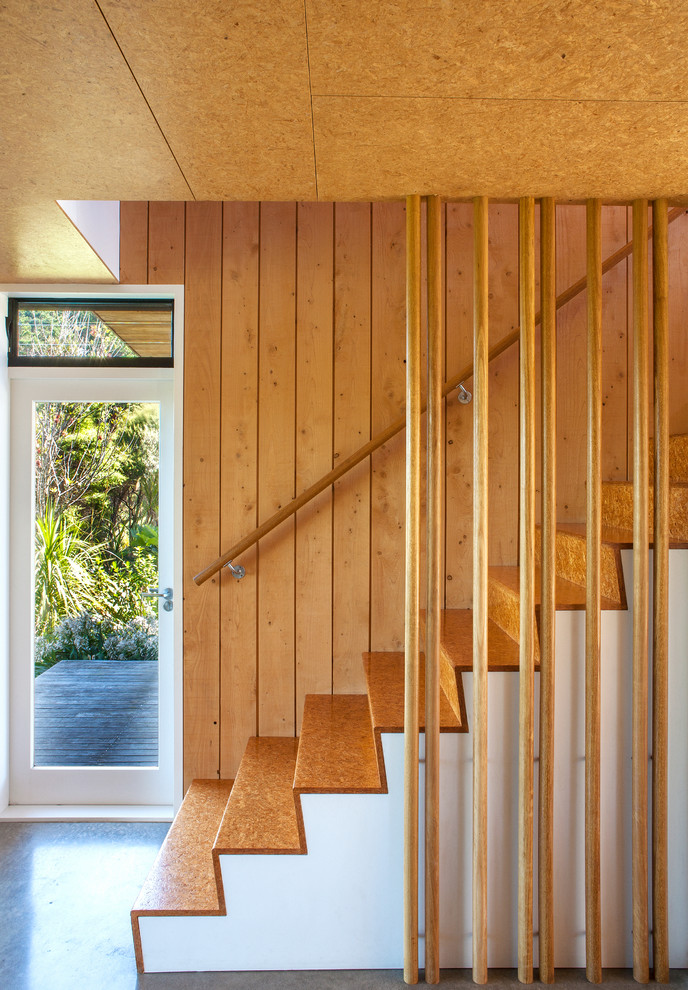 Photo of a mid-sized scandinavian straight staircase in Auckland.