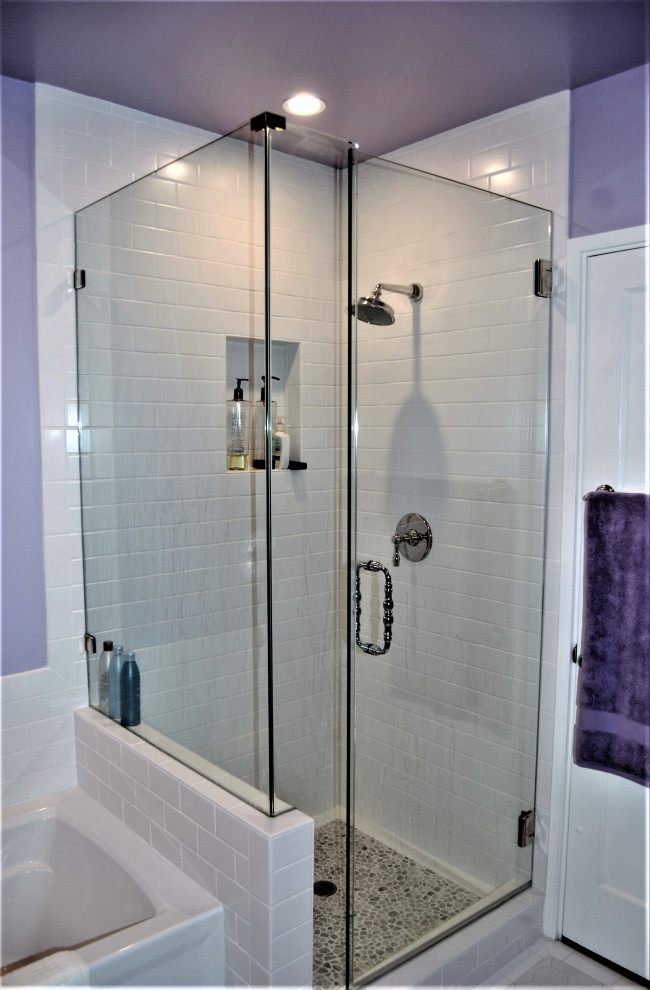 Inspiration for a small traditional master bathroom in Los Angeles with raised-panel cabinets, beige cabinets, an alcove tub, a corner shower, a two-piece toilet, white tile, subway tile, purple walls, porcelain floors, an undermount sink, marble benchtops, beige floor, a hinged shower door, multi-coloured benchtops, a single vanity and a built-in vanity.