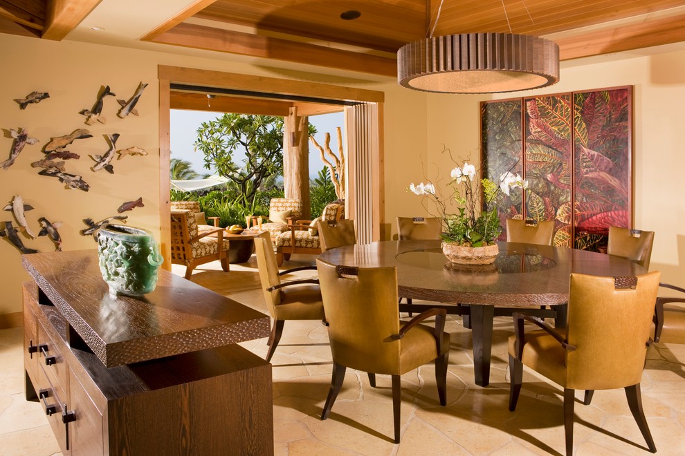This is an example of a tropical dining room in Hawaii with beige walls.