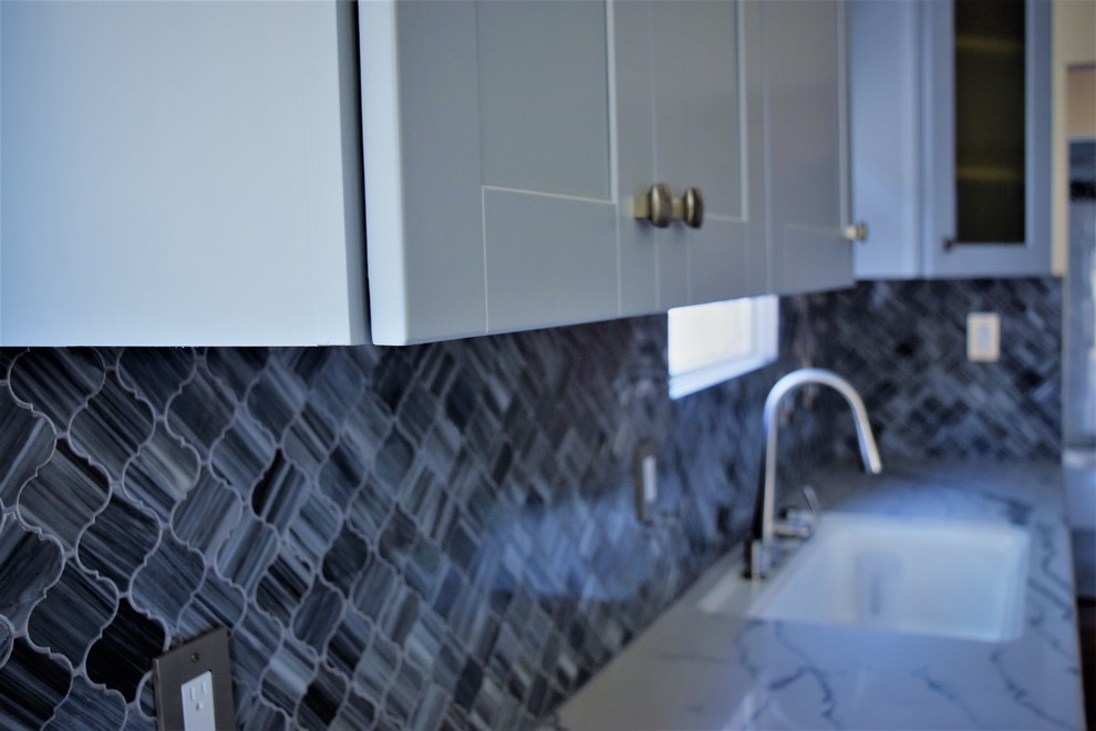 Example of a trendy home design design in San Diego