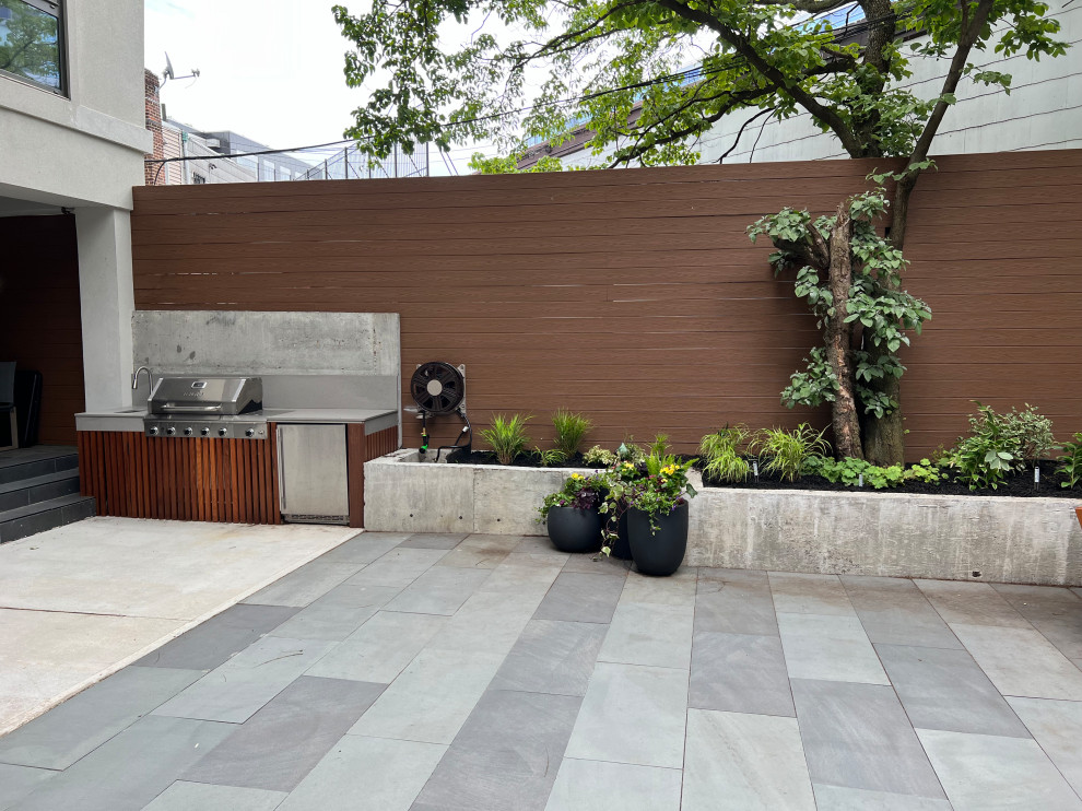 Outdoor kitchen with BBQ insert