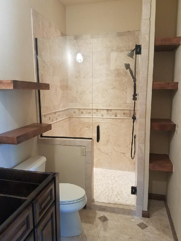 Home theater room turned guest room with bathroom