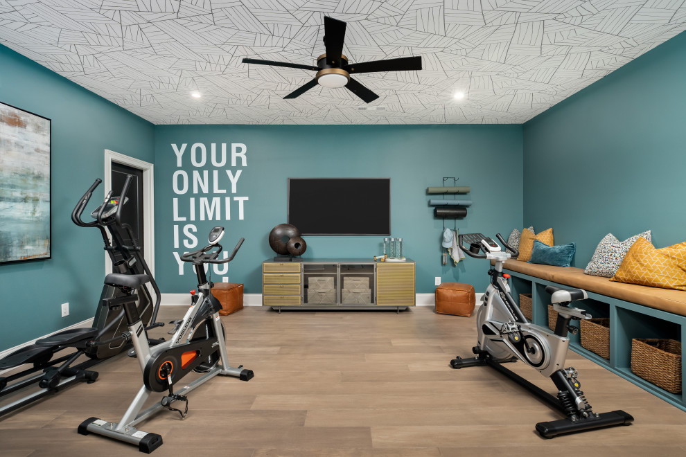 Classic home gym in Nashville with blue walls, medium hardwood flooring, brown floors, a wallpapered ceiling and a feature wall.
