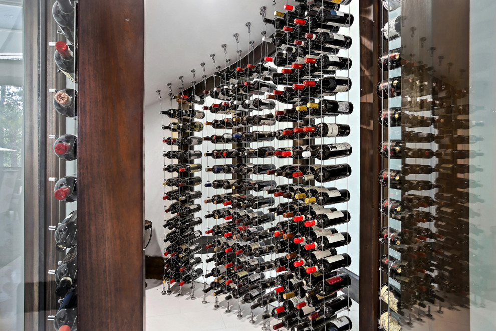 This is an example of a mediterranean wine cellar in Houston.