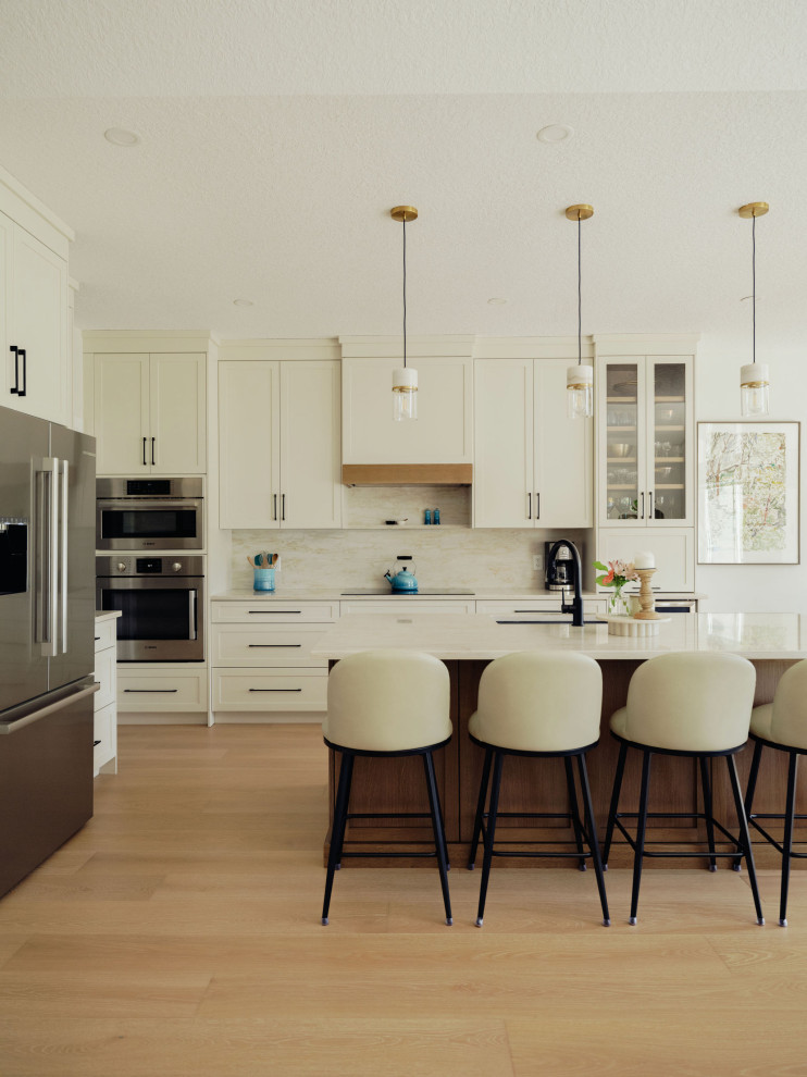 Example of a transitional kitchen design in Edmonton