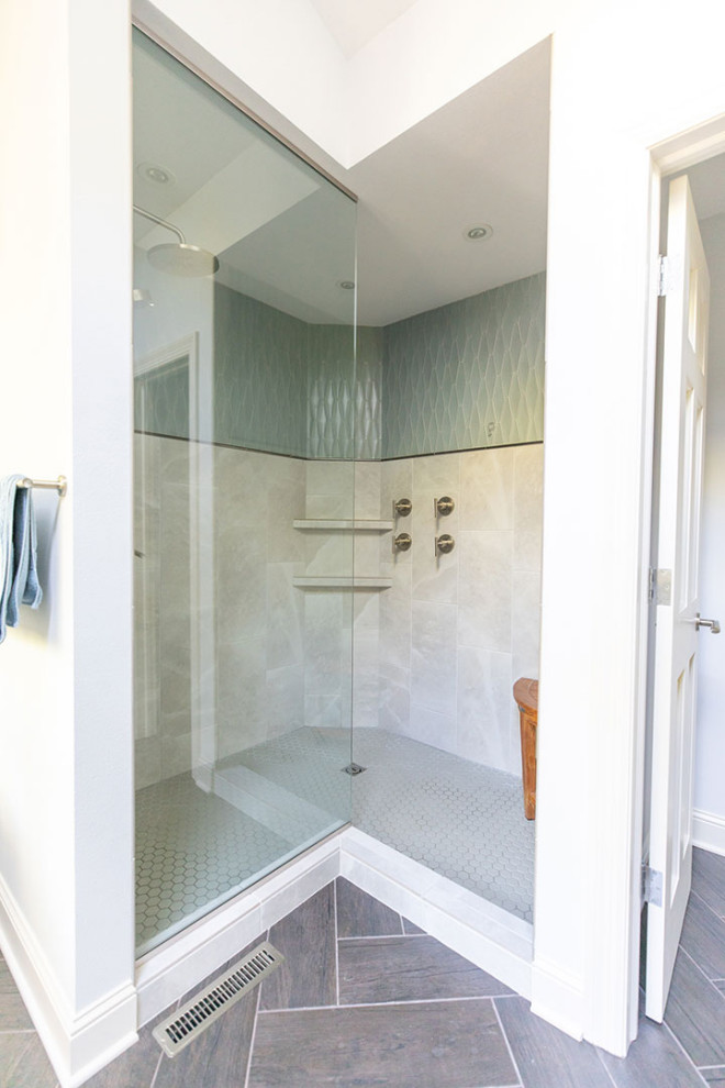 This is an example of a large contemporary master bathroom in Other with shaker cabinets, medium wood cabinets, a freestanding tub, an alcove shower, a two-piece toilet, gray tile, porcelain tile, white walls, an undermount sink, engineered quartz benchtops, grey floor, an open shower, white benchtops, an enclosed toilet, a double vanity, a built-in vanity and ceramic floors.