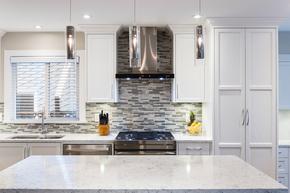 Example of a transitional kitchen design in Vancouver