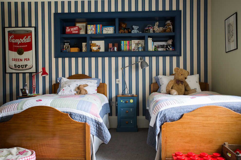 This is an example of a traditional kids' room for boys in Belfast with multi-coloured walls and carpet.