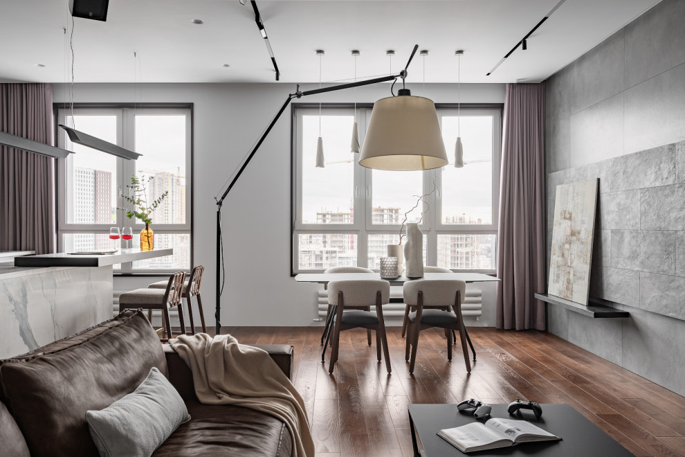 Idee per un soggiorno contemporaneo di medie dimensioni con pavimento in legno massello medio, pavimento beige, pareti grigie, nessuna TV e boiserie