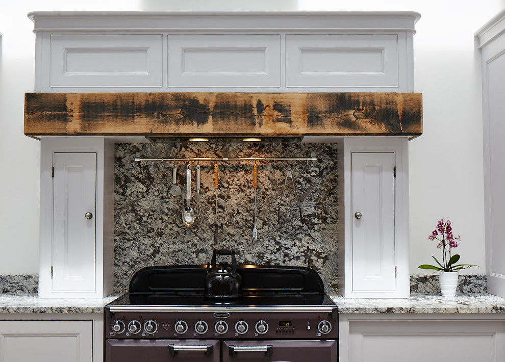This is an example of a large traditional kitchen/diner with a submerged sink, beaded cabinets, grey cabinets, granite worktops, multi-coloured splashback, ceramic flooring, an island, multi-coloured floors and multicoloured worktops.