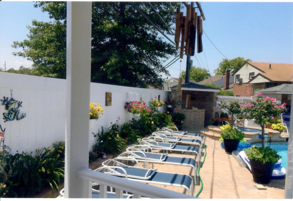 Pool with Whirl pool spill over, outdoor kitchen, outdoor bar, Pergola& Patio