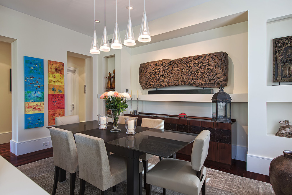 This is an example of a mid-sized contemporary open plan dining in New York with beige walls and dark hardwood floors.
