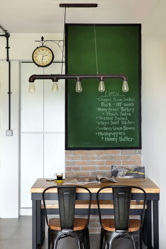 Example of a small urban dining room design in Singapore